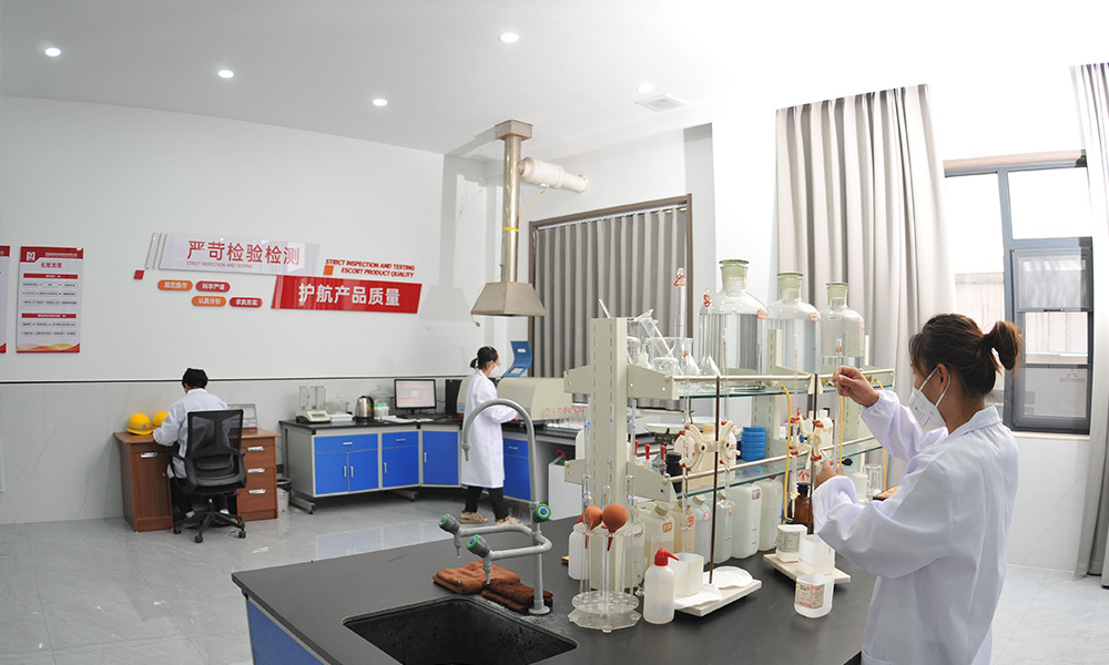Laboratory staff and glassware